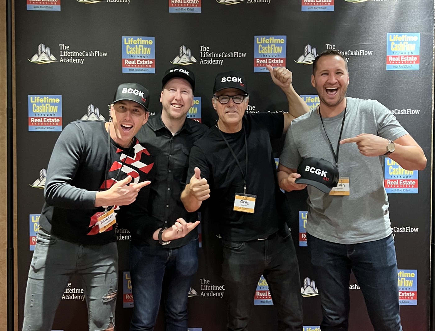 The BCGK Communities team celebrating together at a real estate investing conference in Colorado